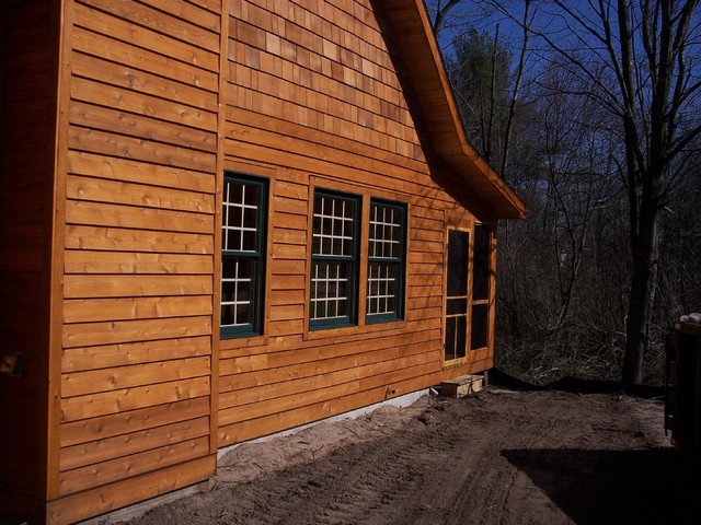 Exterior Cedar lap siding.