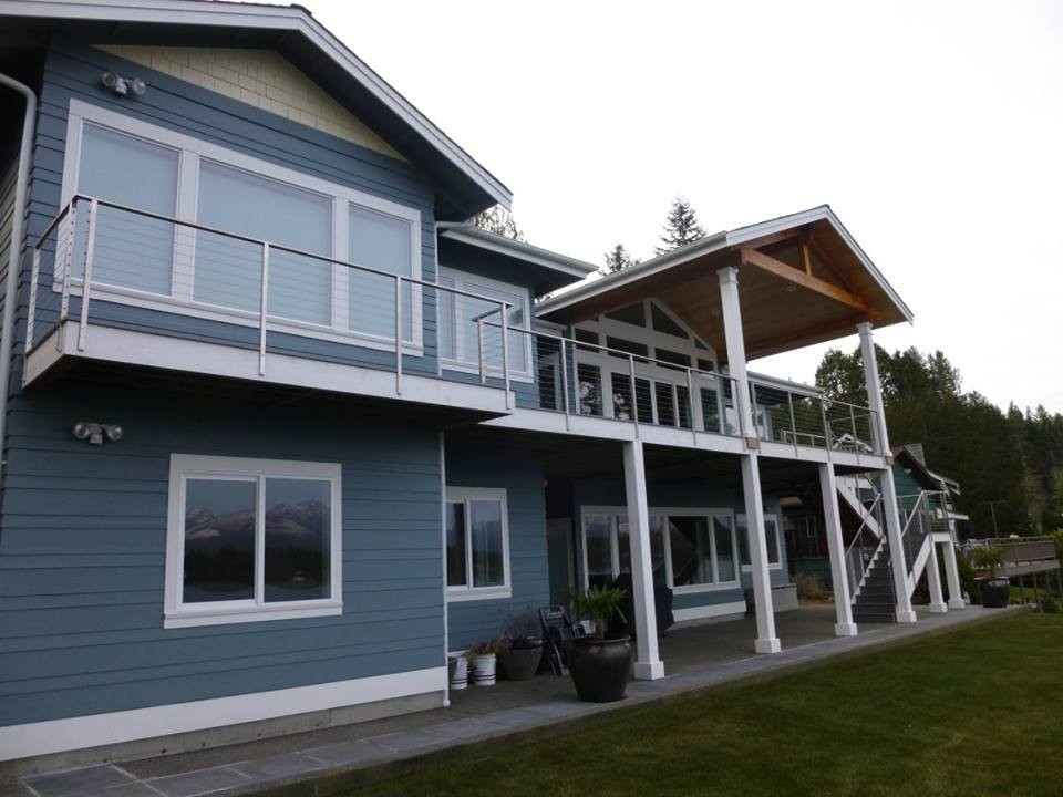 Photo of a medium sized and blue classic two floor house exterior in Seattle.