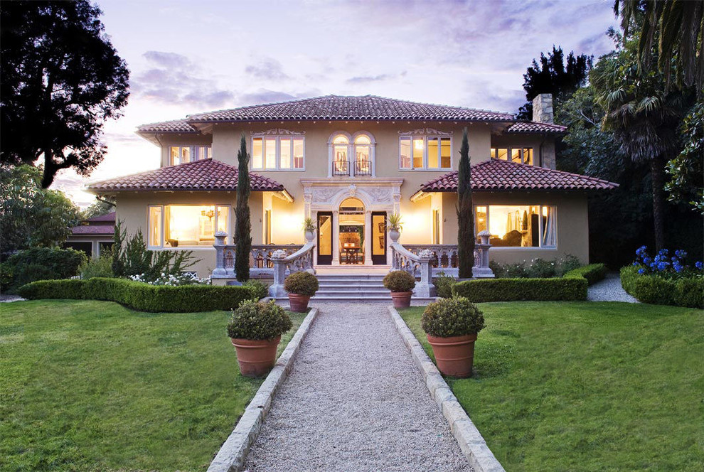Tuscan two-story stucco exterior home photo in Santa Barbara