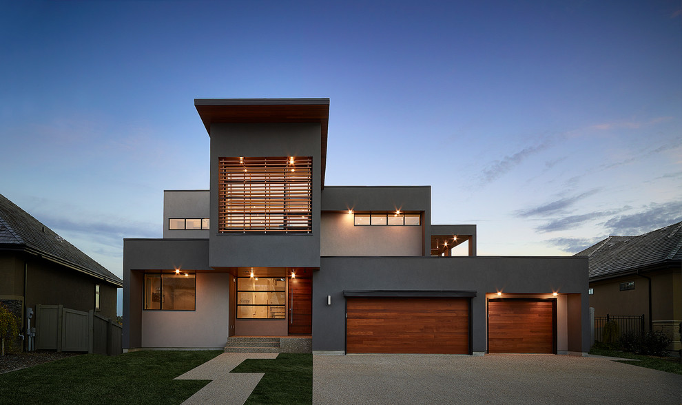 Design ideas for a gey contemporary two floor house exterior in Edmonton.