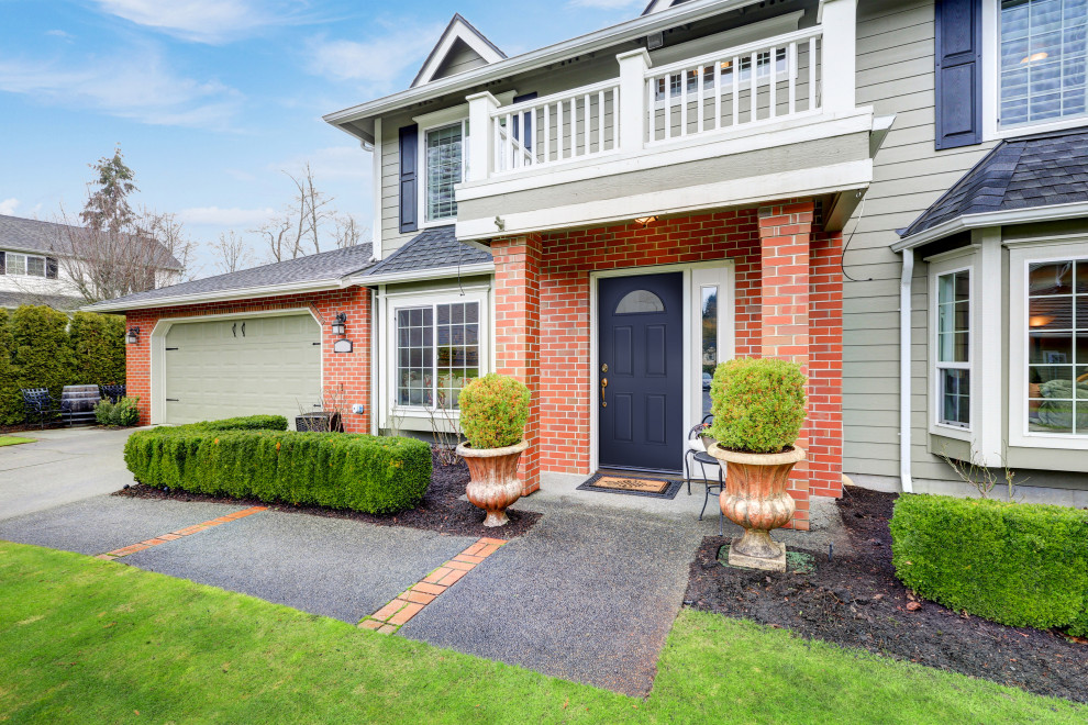 Exterior of American Colonial Style Home with Brick and ...