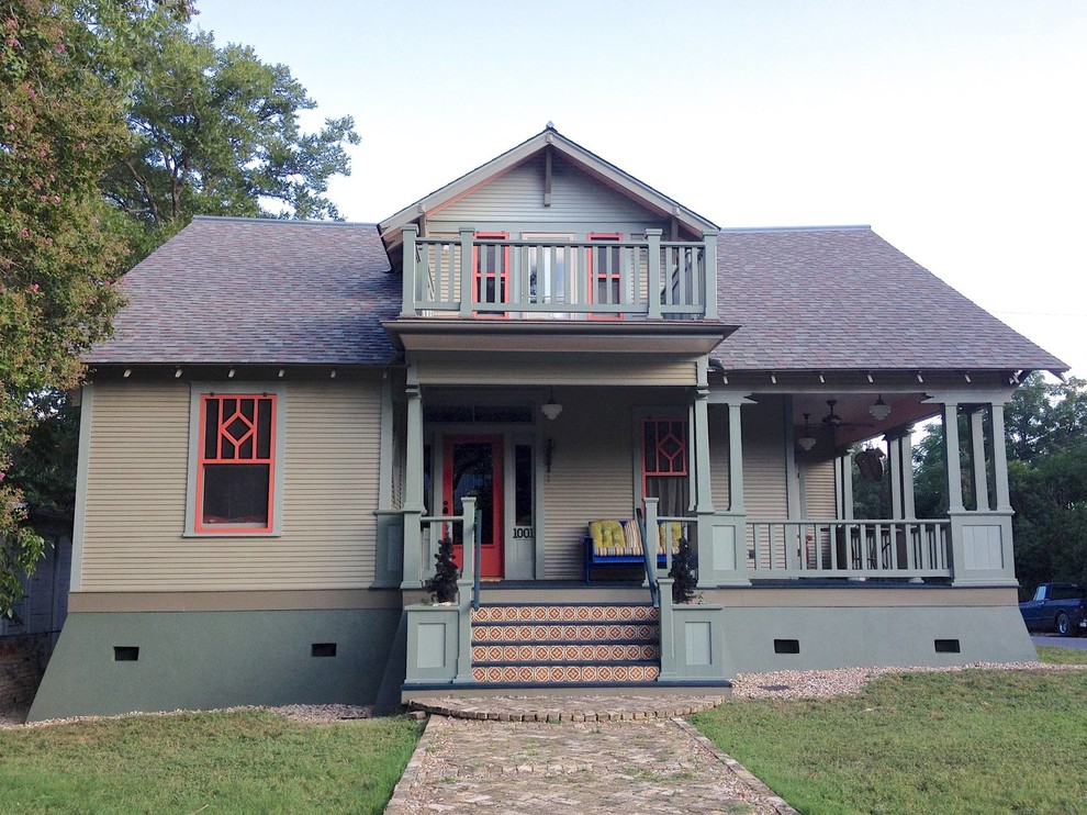 Inspiration for a mid-sized eclectic green two-story wood exterior home remodel in Austin