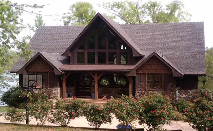 Example of a mid-sized mountain style brown two-story mixed siding exterior home design in Atlanta