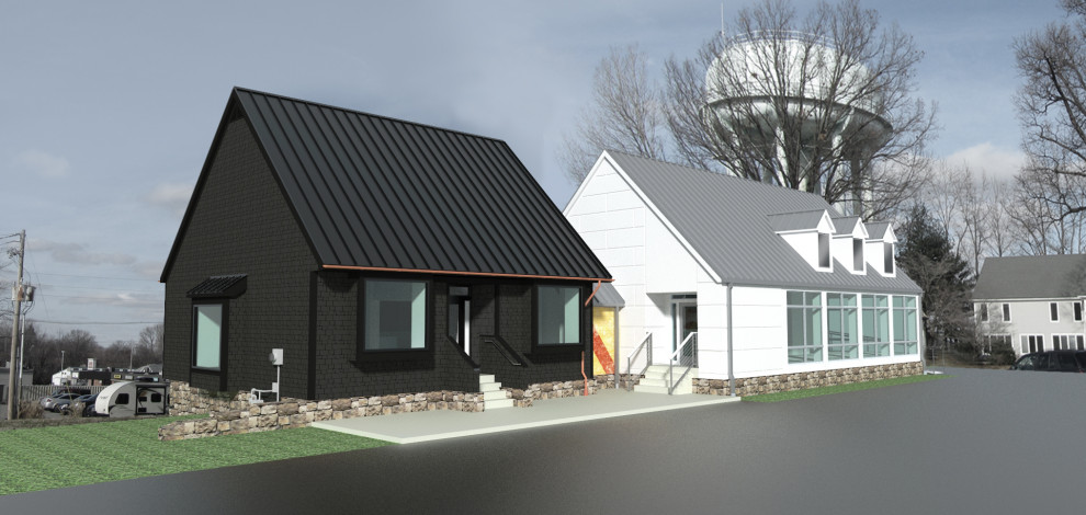 Idée de décoration pour une façade de maison noire minimaliste de taille moyenne et à un étage avec un revêtement mixte, un toit à deux pans et un toit en métal.