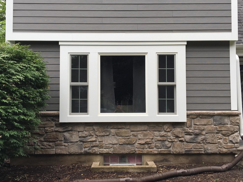 Exterior renovation in Aurora IL with new siding, windows, and stone ...