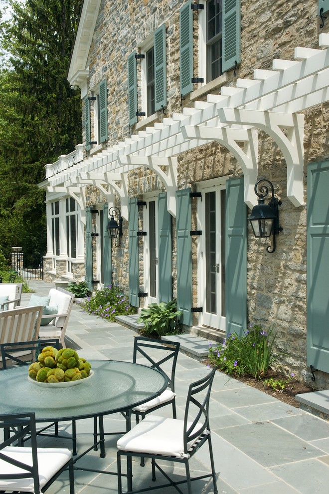 Inspiration for a timeless stone exterior home remodel in Cincinnati