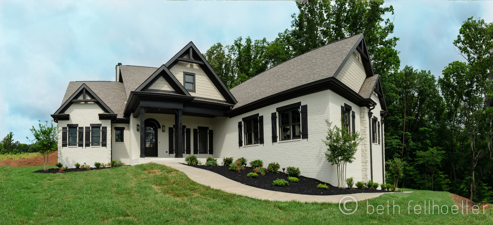 Inspiration for a transitional exterior home remodel in Other