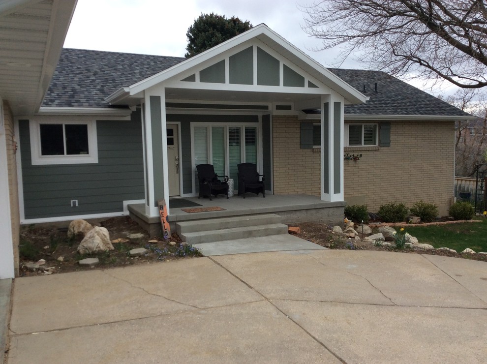 This is an example of a medium sized and multi-coloured classic bungalow detached house in Salt Lake City with mixed cladding, a hip roof and a shingle roof.
