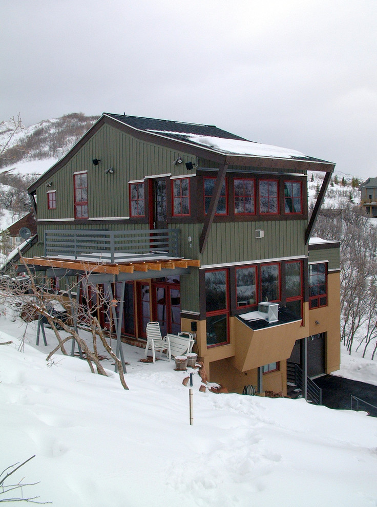 This is an example of a rustic house exterior in Salt Lake City with wood cladding.