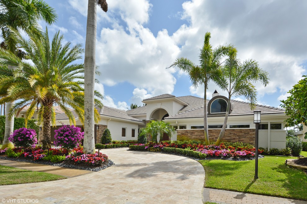 Example of a transitional exterior home design in Miami