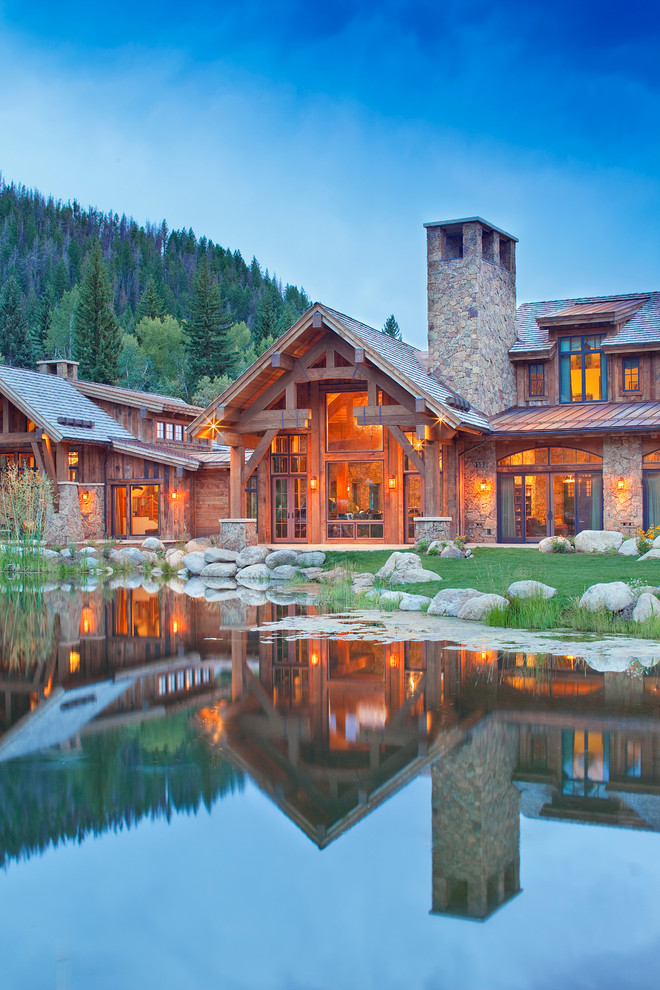 Inspiration for a rustic two-story exterior home remodel in Denver