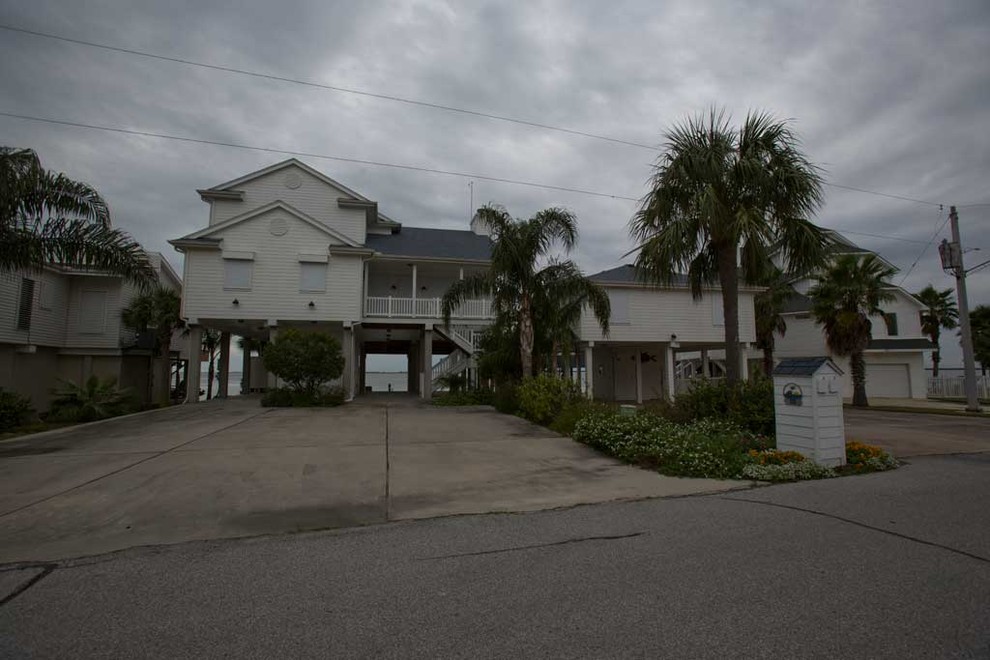 Exterior View of Family Getaway Beach House Beach Style Exterior Houston by K&N Sales