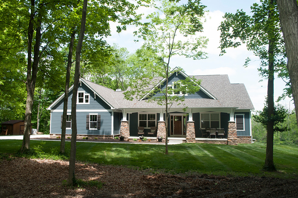 Photo of a blue classic house exterior in Columbus with mixed cladding.