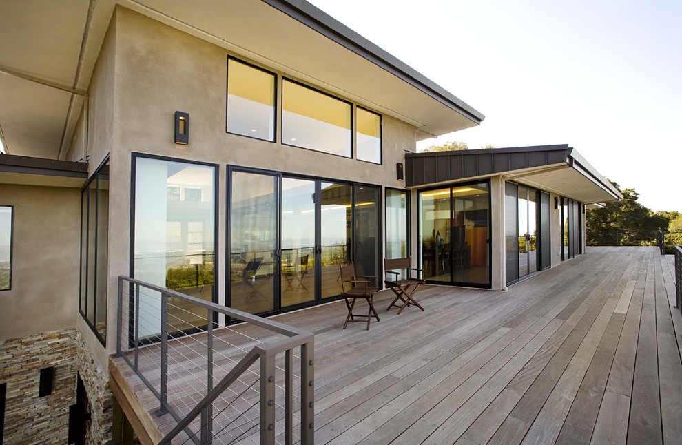 Photo of a contemporary bungalow concrete house exterior in San Francisco.
