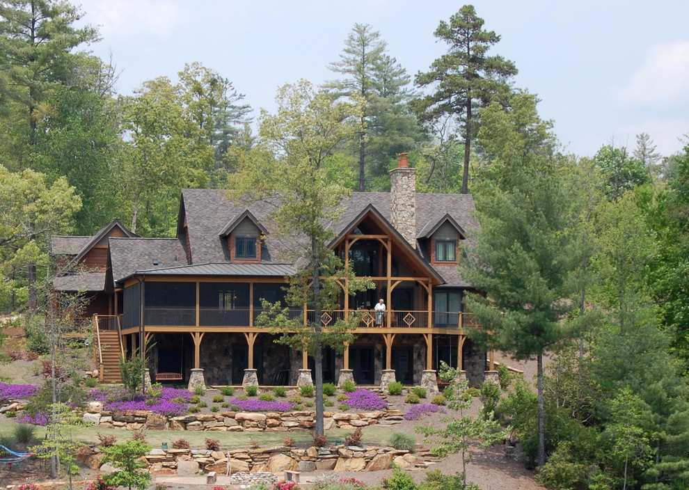 Design ideas for a rustic house exterior in Charlotte.