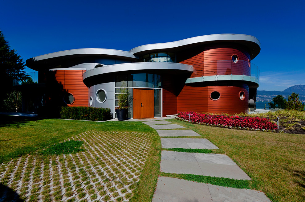 Idee per la facciata di una casa rossa contemporanea a due piani