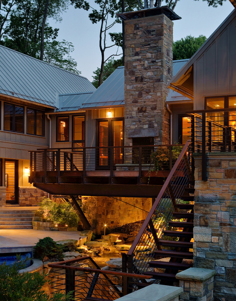 Свежая идея для дизайна: дом в стиле рустика с облицовкой из камня - отличное фото интерьера