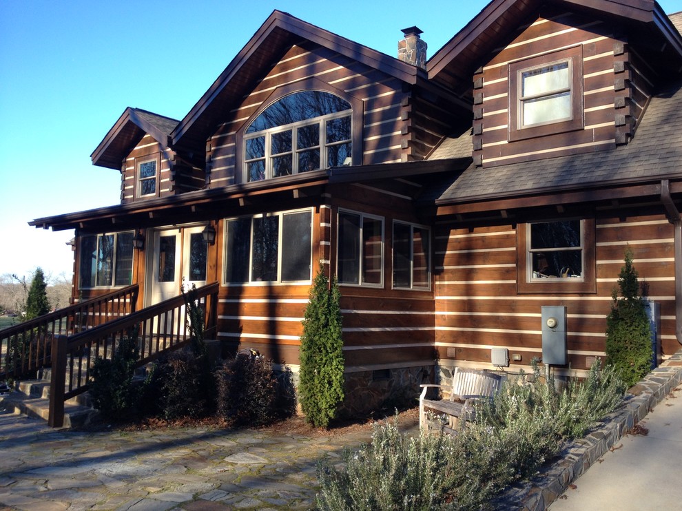 Rustic exterior home idea in Other