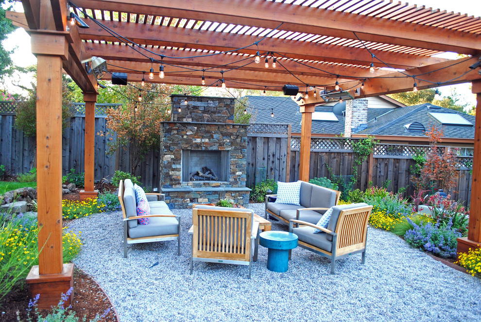 Example of a mid-sized arts and crafts backyard gravel patio design in San Francisco