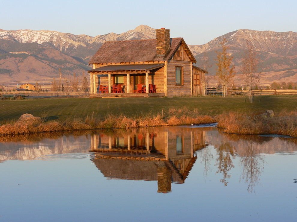 Inspiration for a rustic wood exterior home remodel in Phoenix