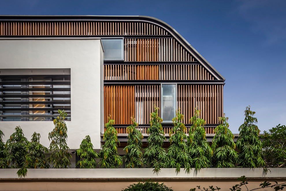 Exemple d'une façade de maison tendance.