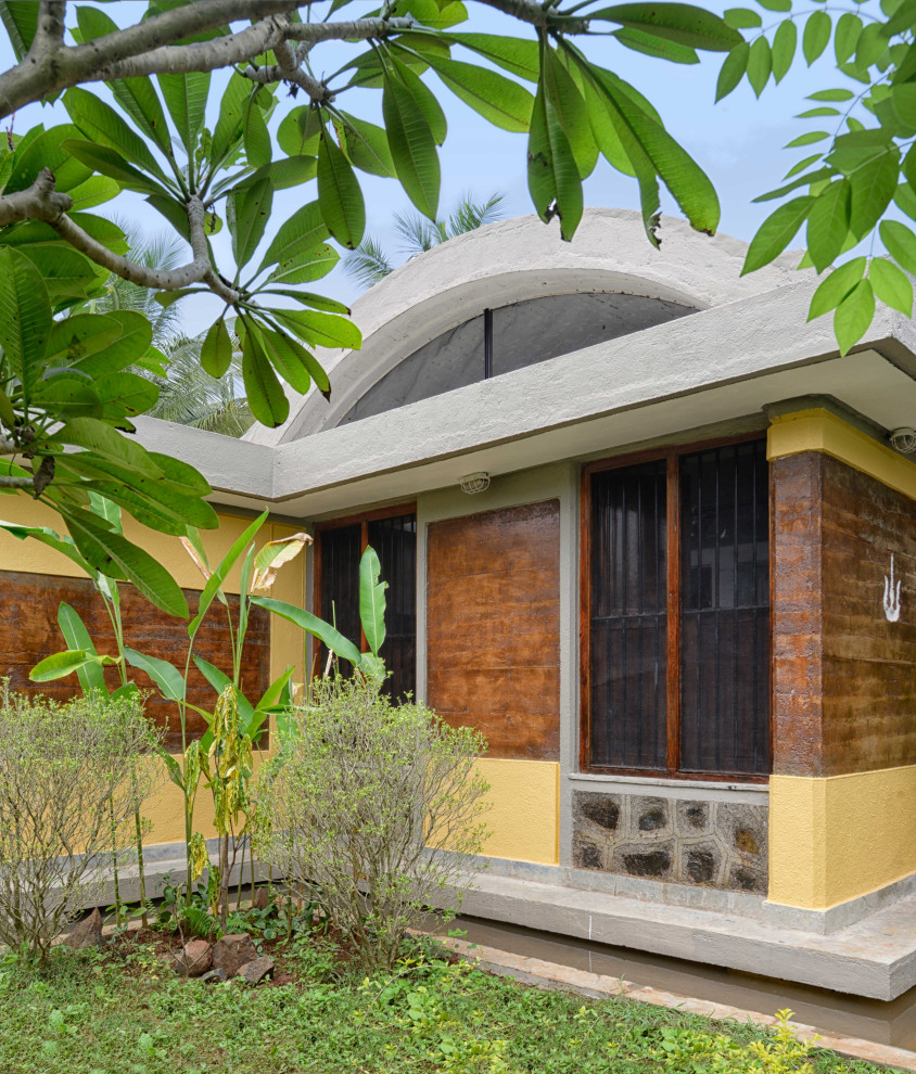 Modelo de fachada de casa de estilo de casa de campo grande de una planta con tejado de varios materiales