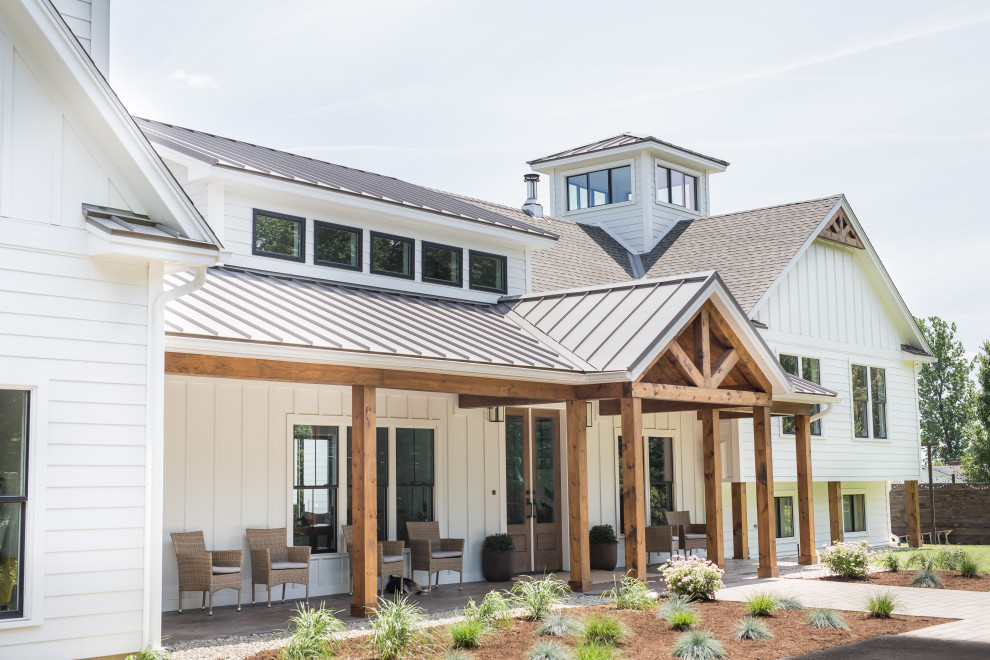 Farmer's Porch with Metal Roof Farmhouse Exterior Boston by ATA