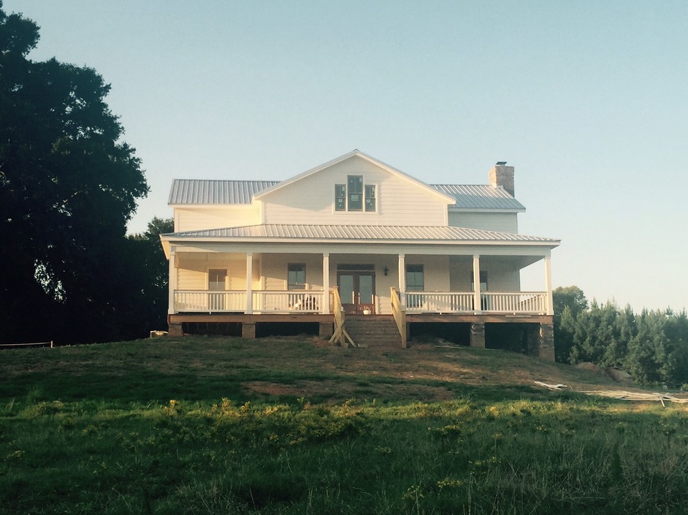 Country white two-story concrete fiberboard exterior home idea in Atlanta