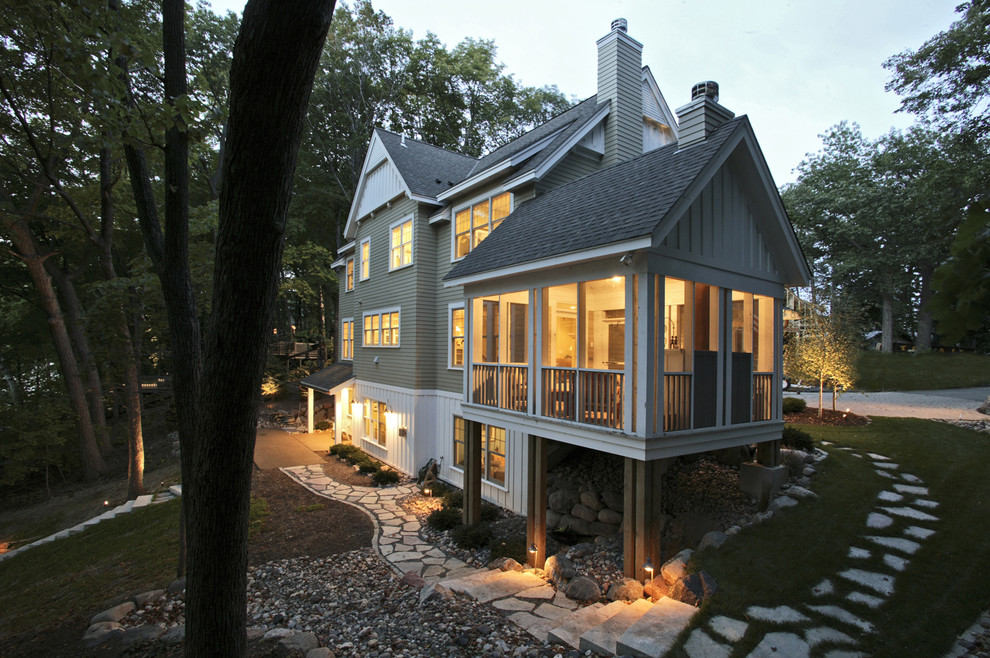 Example of a cottage exterior home design in Minneapolis