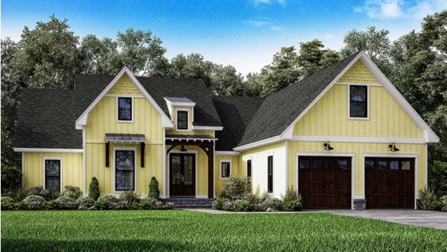 На фото: одноэтажный, деревянный, желтый частный загородный дом в стиле кантри с крышей из гибкой черепицы с