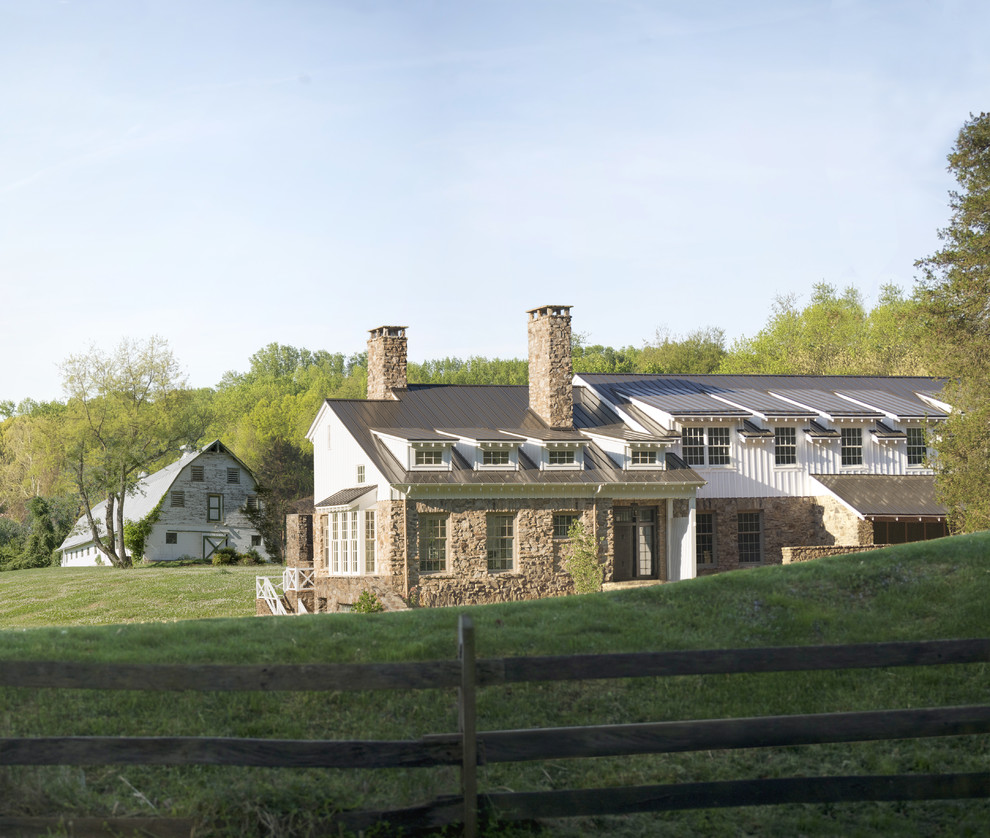 This is an example of a country house exterior in DC Metro with stone cladding.