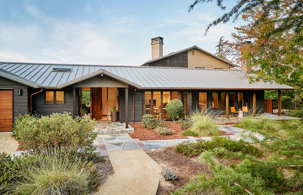 Example of a country exterior home design in San Francisco