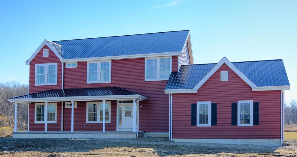 Inspiration for a large and red farmhouse two floor detached house in New York with vinyl cladding, a pitched roof and a metal roof.