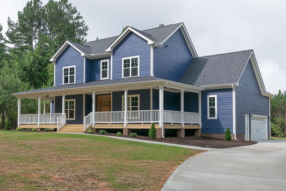 Foto de fachada azul de estilo de casa de campo de tamaño medio de tres plantas