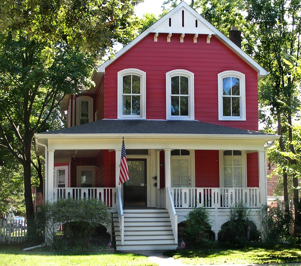 Mid-sized victorian red two-story exterior home idea in Chicago