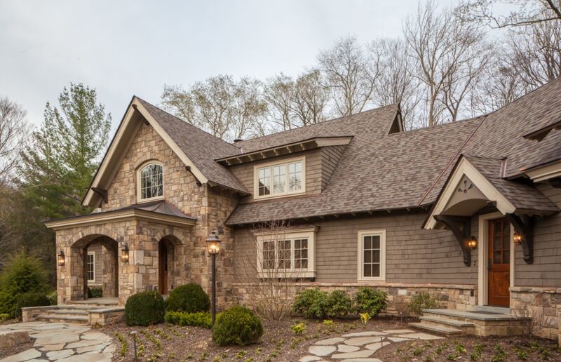 Example of a large mountain style gray two-story mixed siding exterior home design in Charlotte
