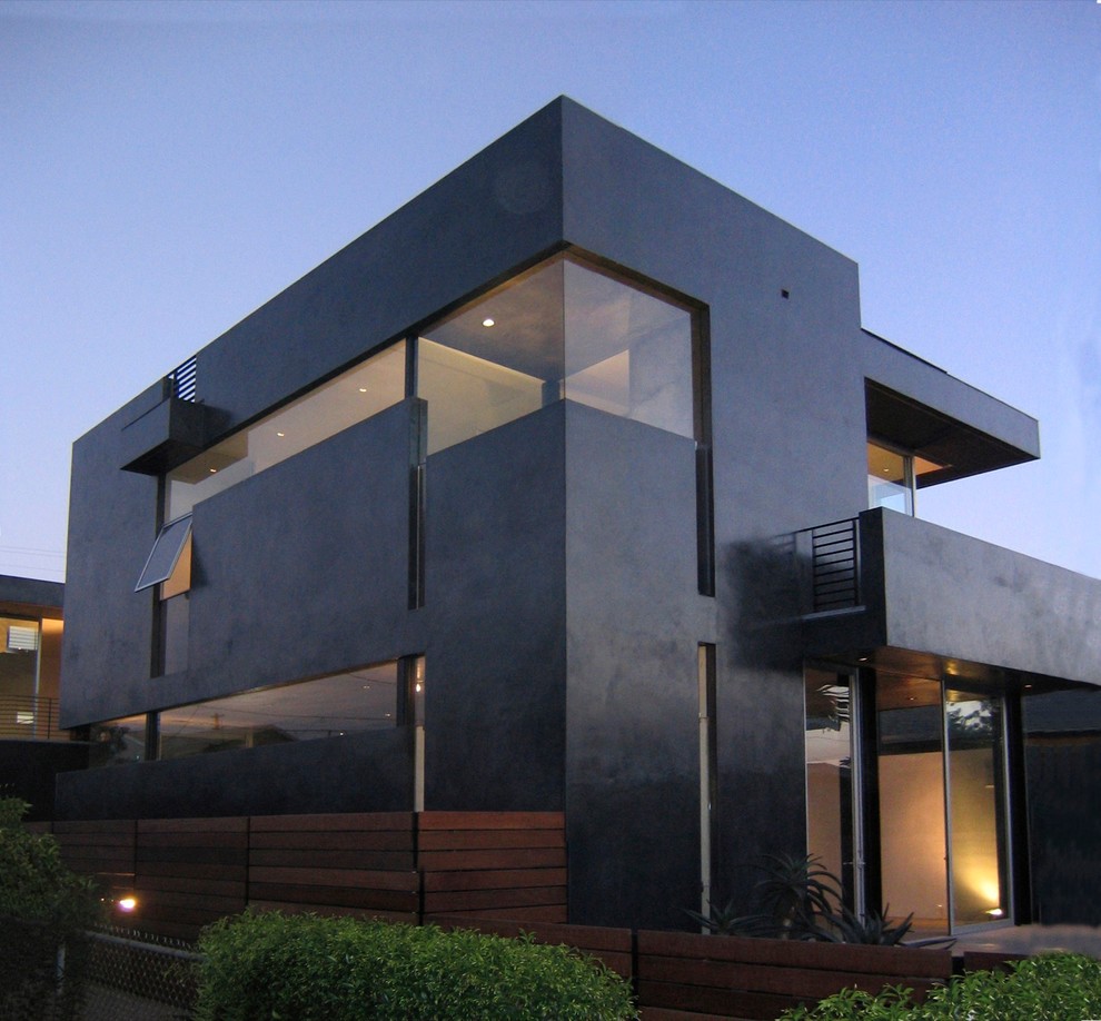 Inspiration for a contemporary black two-story exterior home remodel in Los Angeles with a mixed material roof