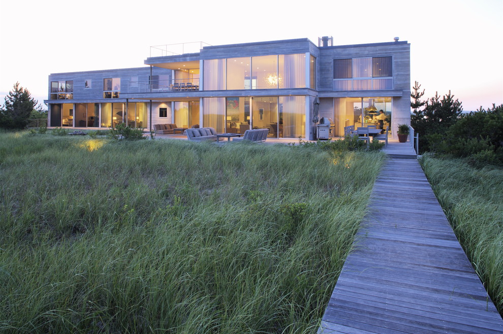 Idée de décoration pour une façade de maison minimaliste.