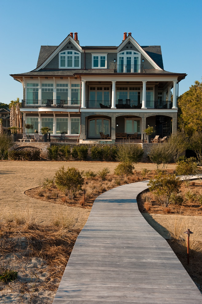 Inspiration for a timeless three-story exterior home remodel in Charleston