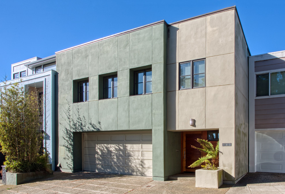 サンフランシスコにある高級な小さなコンテンポラリースタイルのおしゃれな家の外観 (漆喰サイディング、緑の外壁) の写真