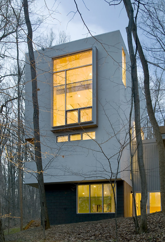 Example of a trendy three-story exterior home design in DC Metro
