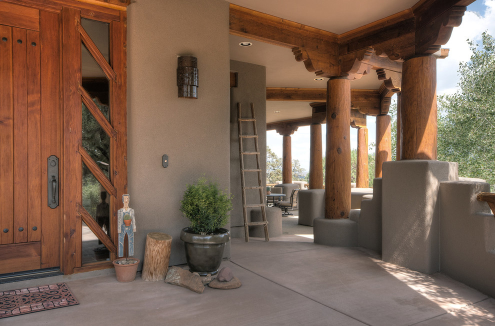 Huge southwest brown stucco exterior home photo in Phoenix