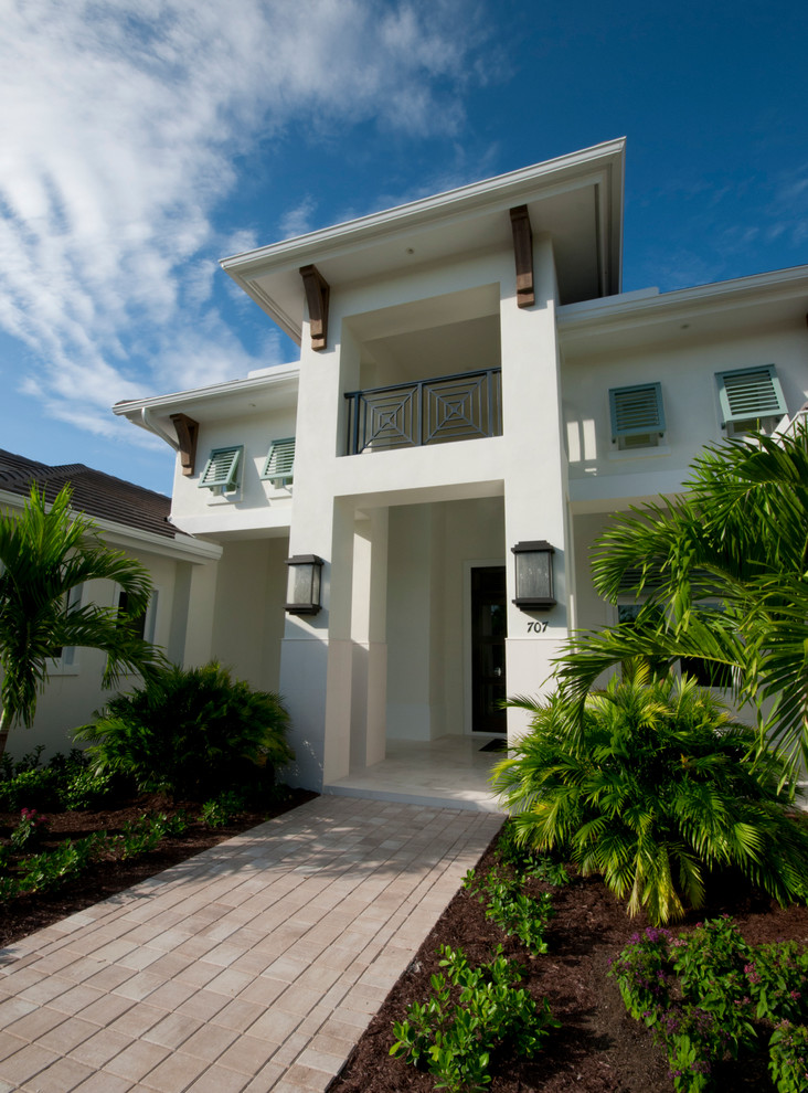 Example of an island style exterior home design in Miami