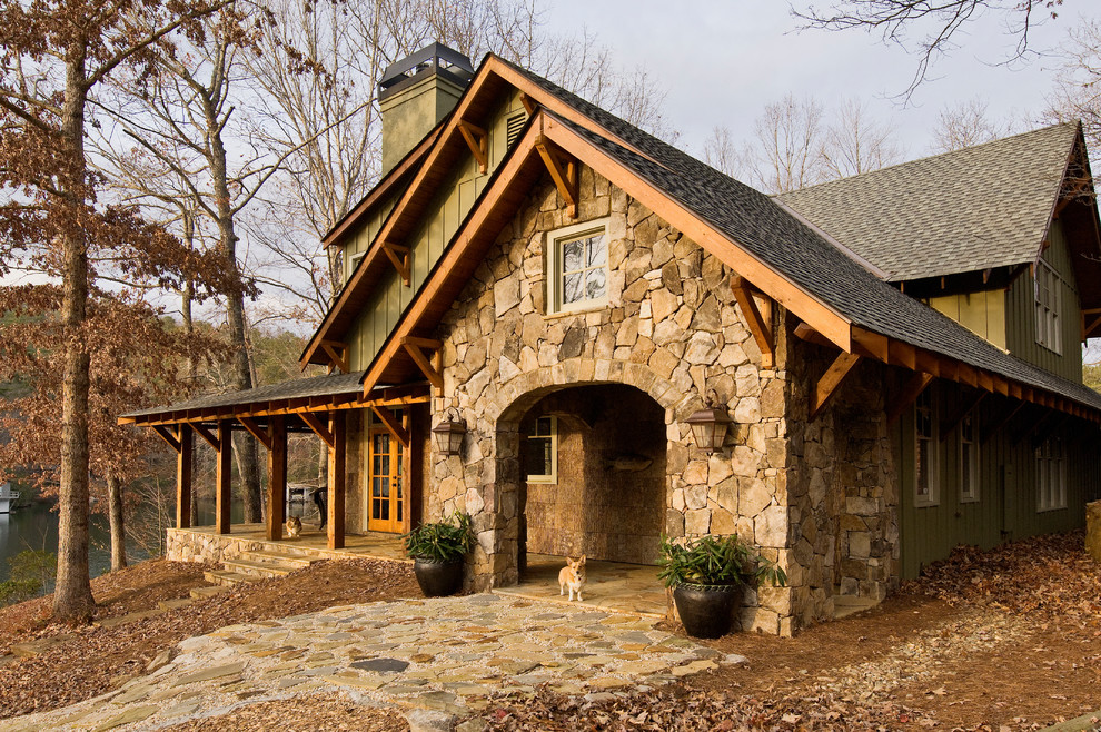 This is an example of a rustic two floor detached house in Atlanta with mixed cladding, a pitched roof and a shingle roof.