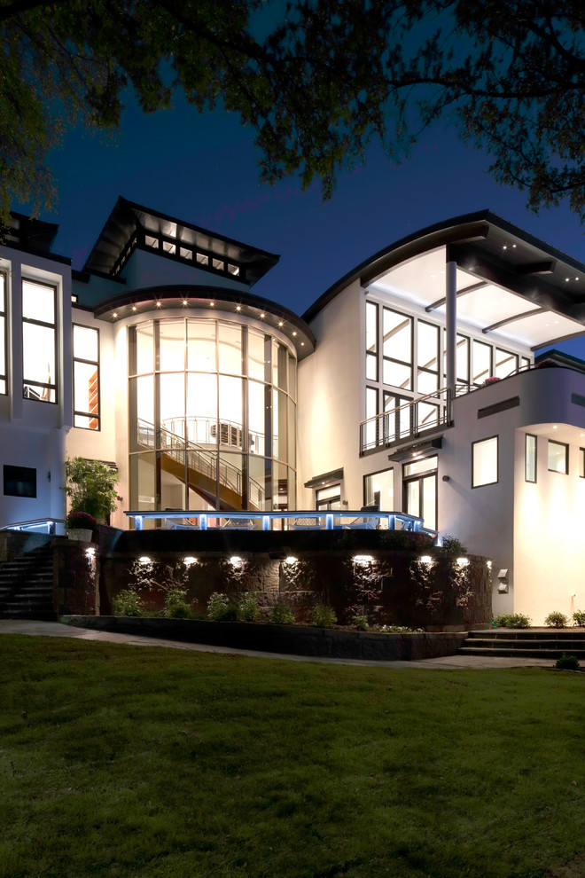 Inspiration for an expansive and white contemporary two floor render house exterior in Dallas.