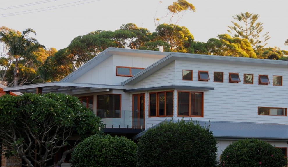 Photo of a contemporary house exterior in Central Coast.