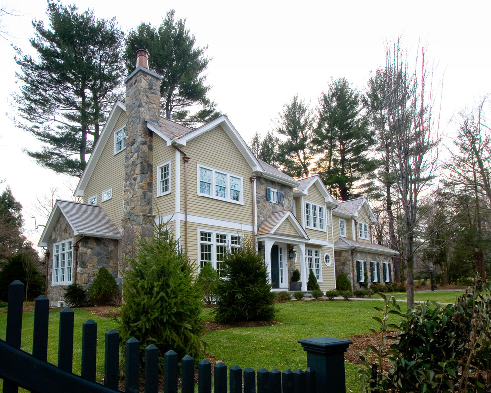 Example of a classic wood exterior home design in Boston