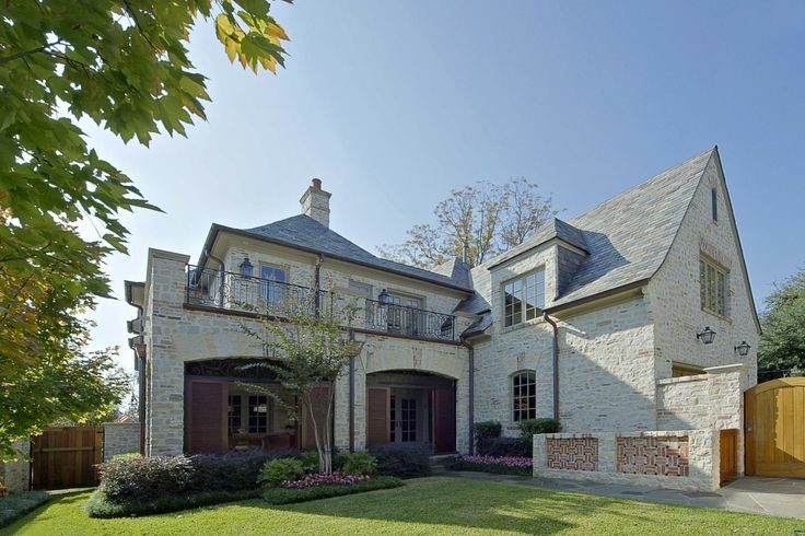 Mid-sized rustic gray two-story stone gable roof idea in Dallas