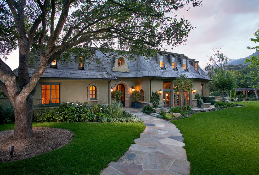 Inspiration for a mid-sized french country two-story exterior home remodel in Santa Barbara