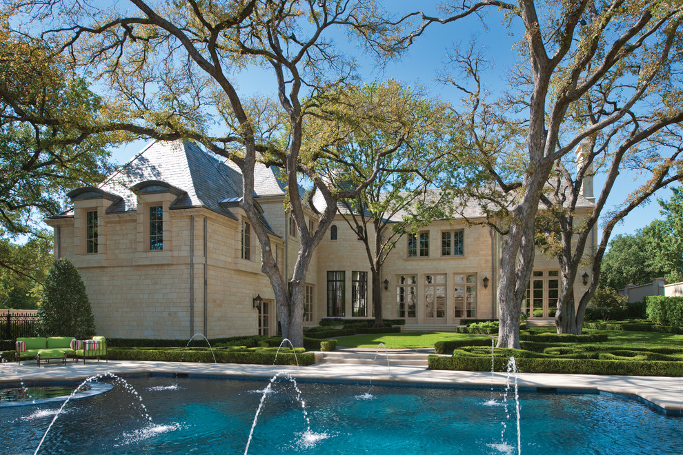 Photo of a classic house exterior in Dallas with stone cladding.